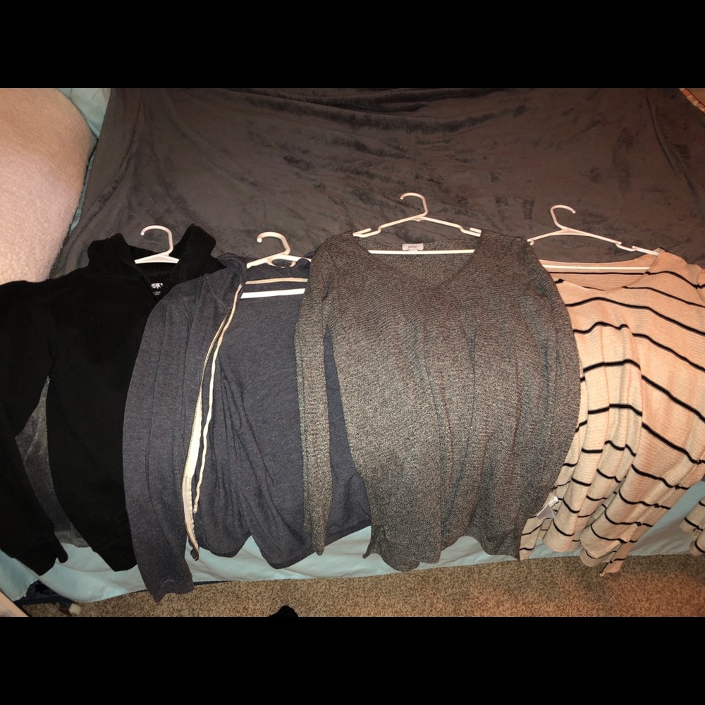 Two zip up and two medium shirts